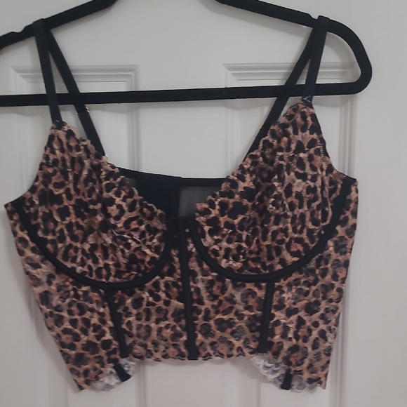 Anthropologie Tops - Anthropologie Animal Print Top with Black Details